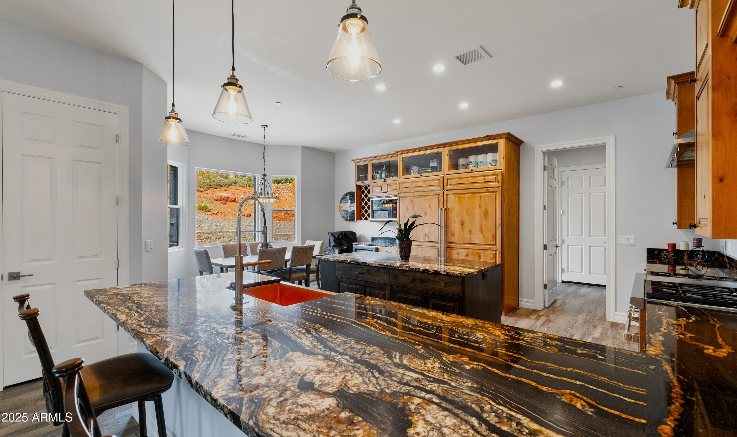 10 Ho Hum Circle Sedona, AZ 86351 - Photo 15 of 48 a living room with furniture and a flat screen tv