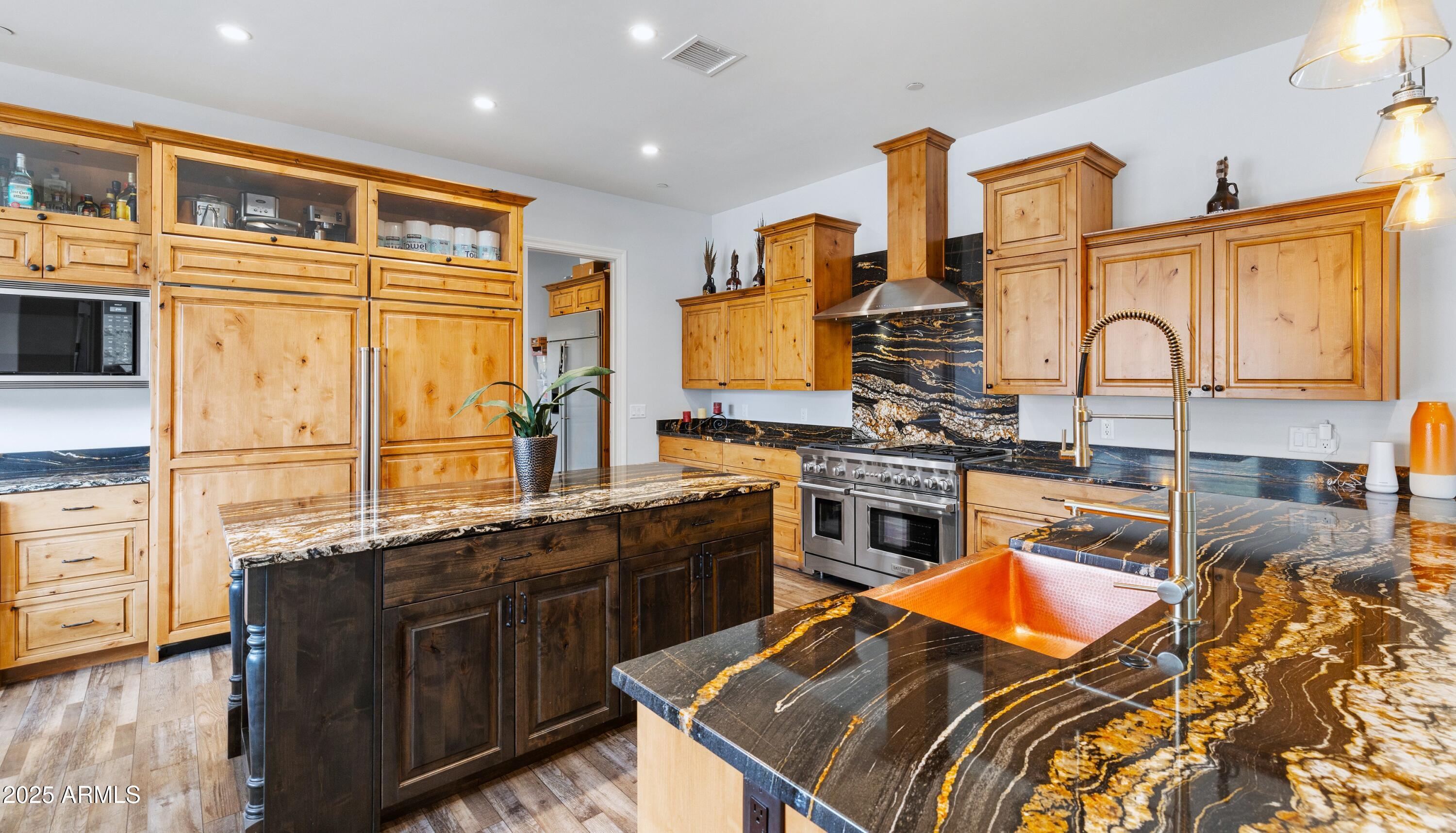 10 Ho Hum Circle Sedona, AZ 86351 - Photo 16 of 48 a kitchen with stainless steel appliances granite countertop a stove and a sink