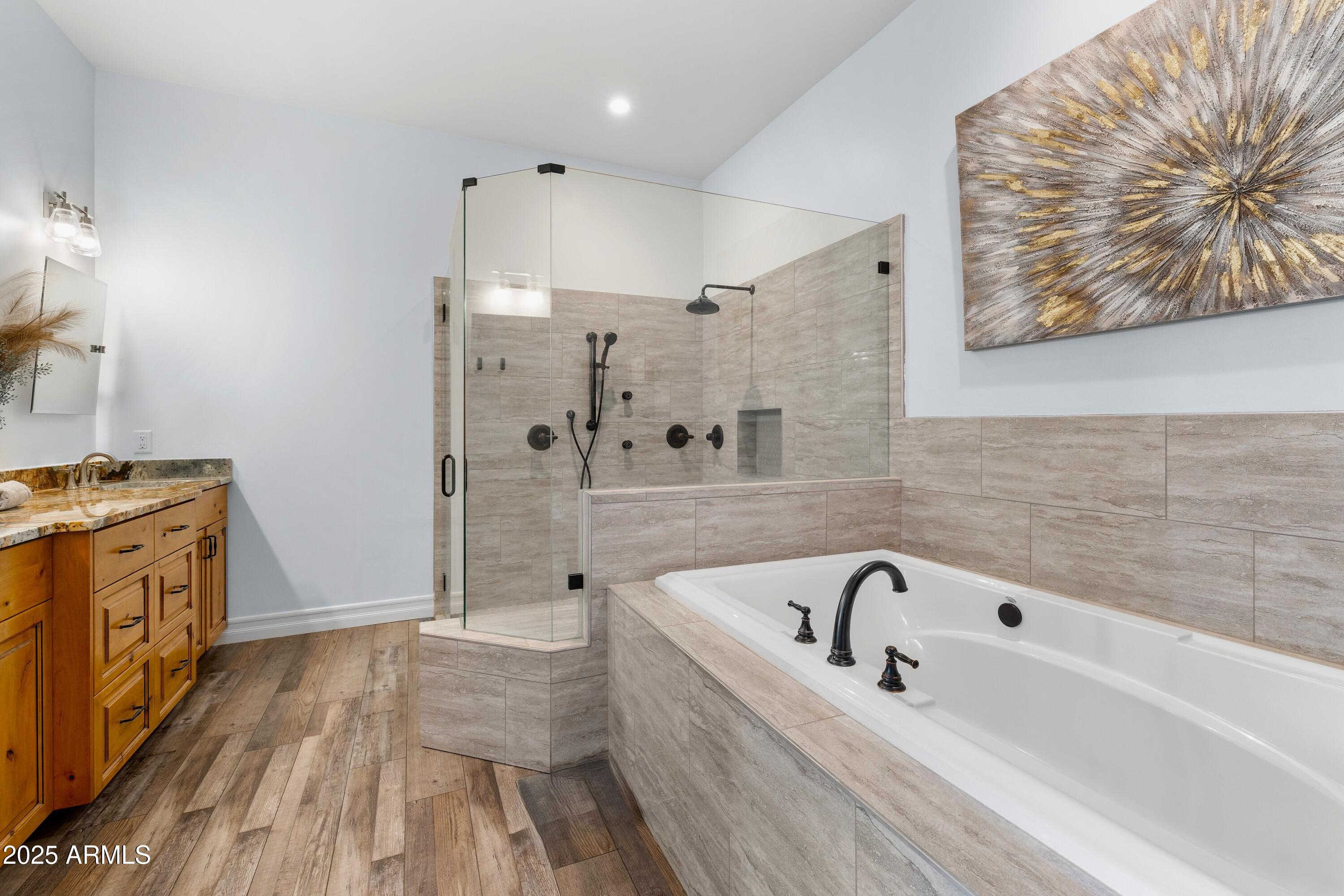 10 Ho Hum Circle Sedona, AZ 86351 - Photo 25 of 48 a bathroom with a bathtub and a shower