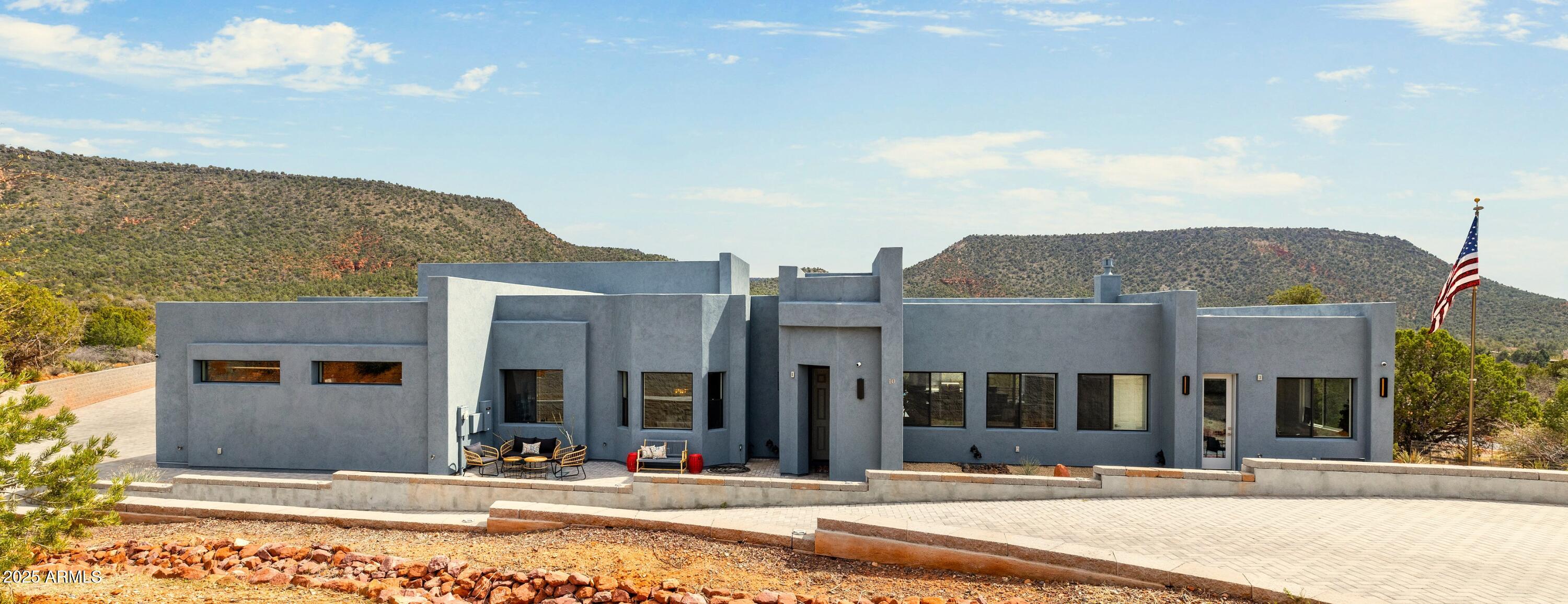 10 Ho Hum Circle Sedona, AZ 86351 - Photo 2 of 48 a view of a building along the street