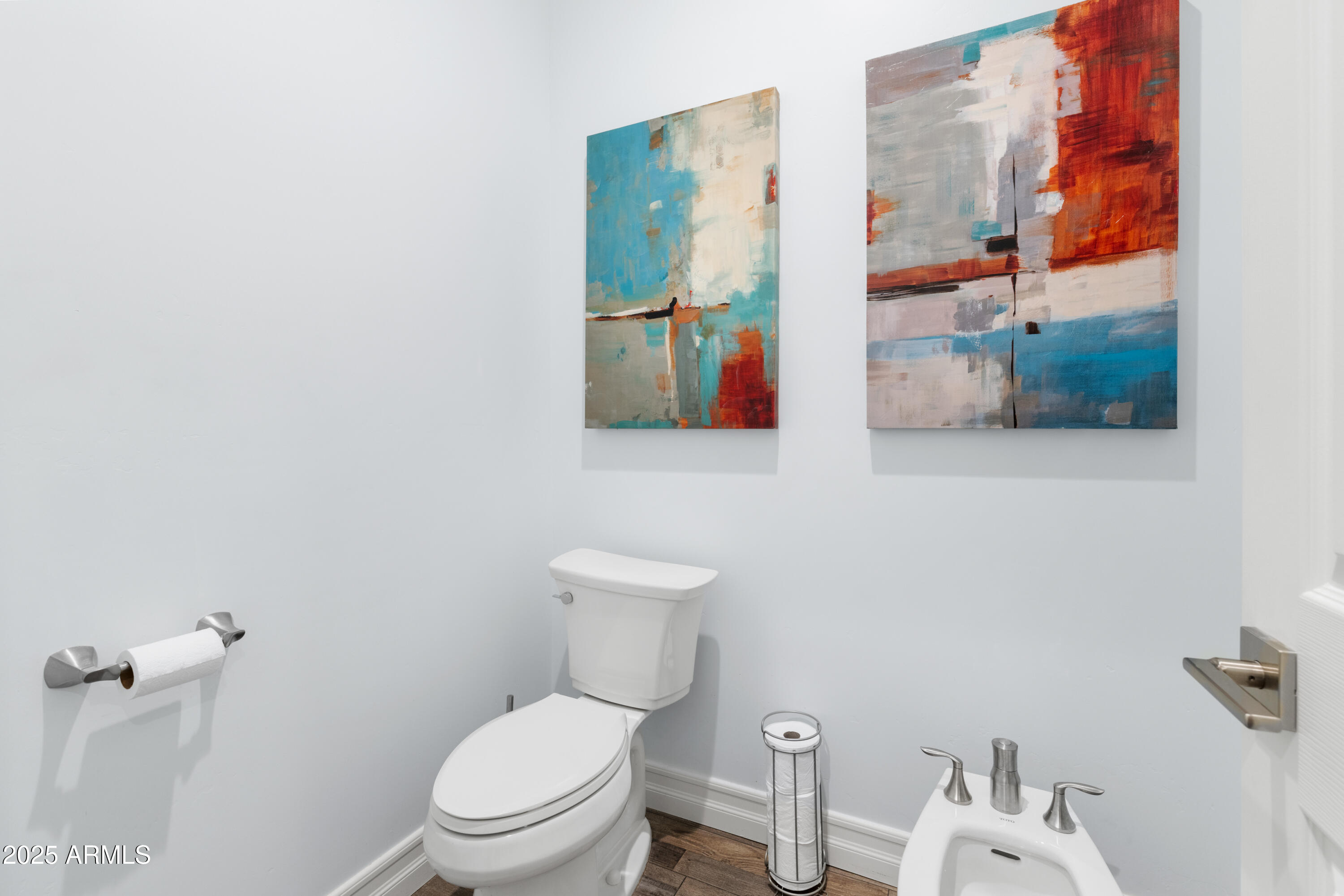 10 Ho Hum Circle Sedona, AZ 86351 - Photo 29 of 48 a white toilet sitting next to a bathroom sink