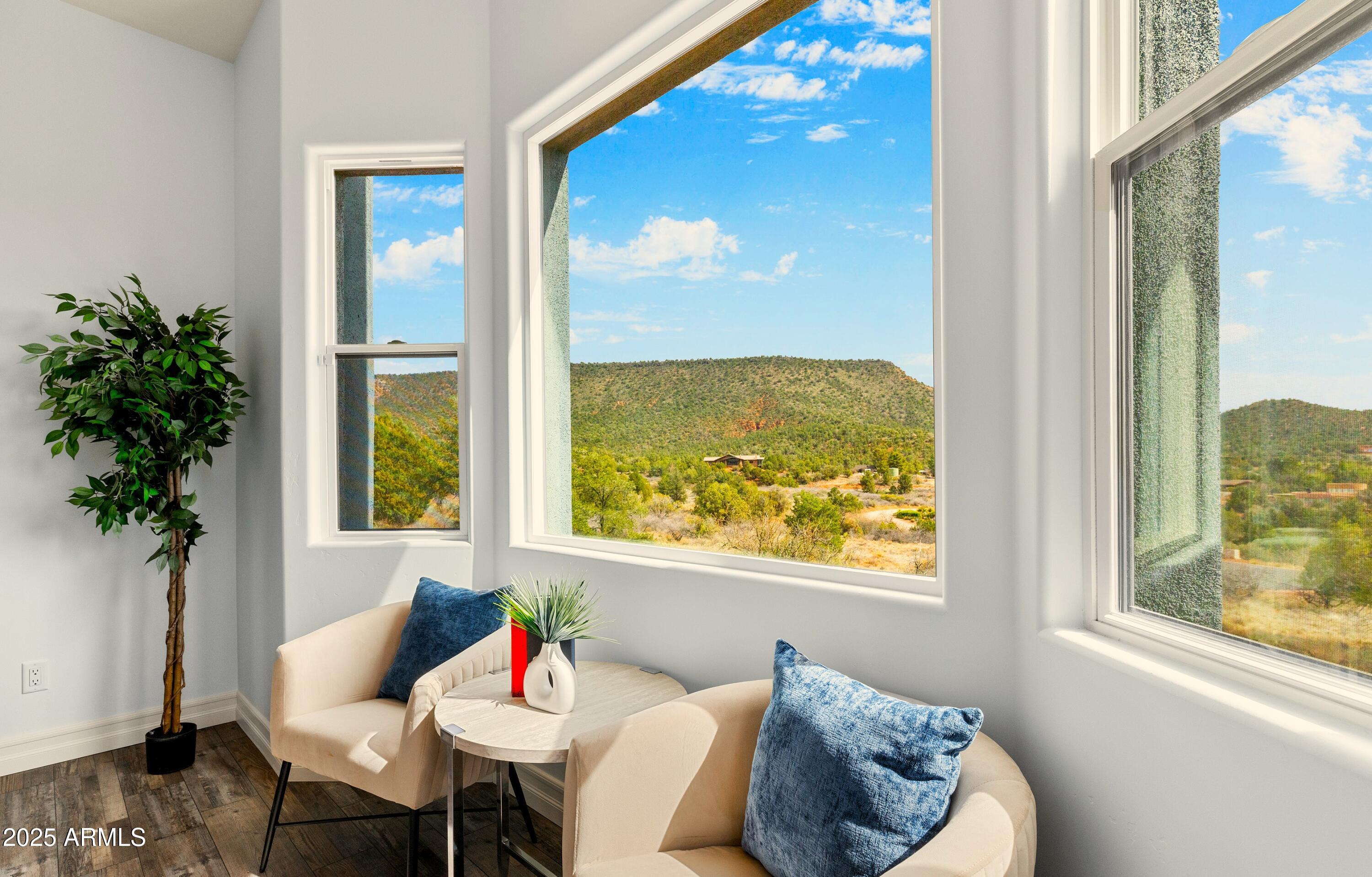 10 Ho Hum Circle Sedona, AZ 86351 - Photo 32 of 48 a living room with furniture and a window