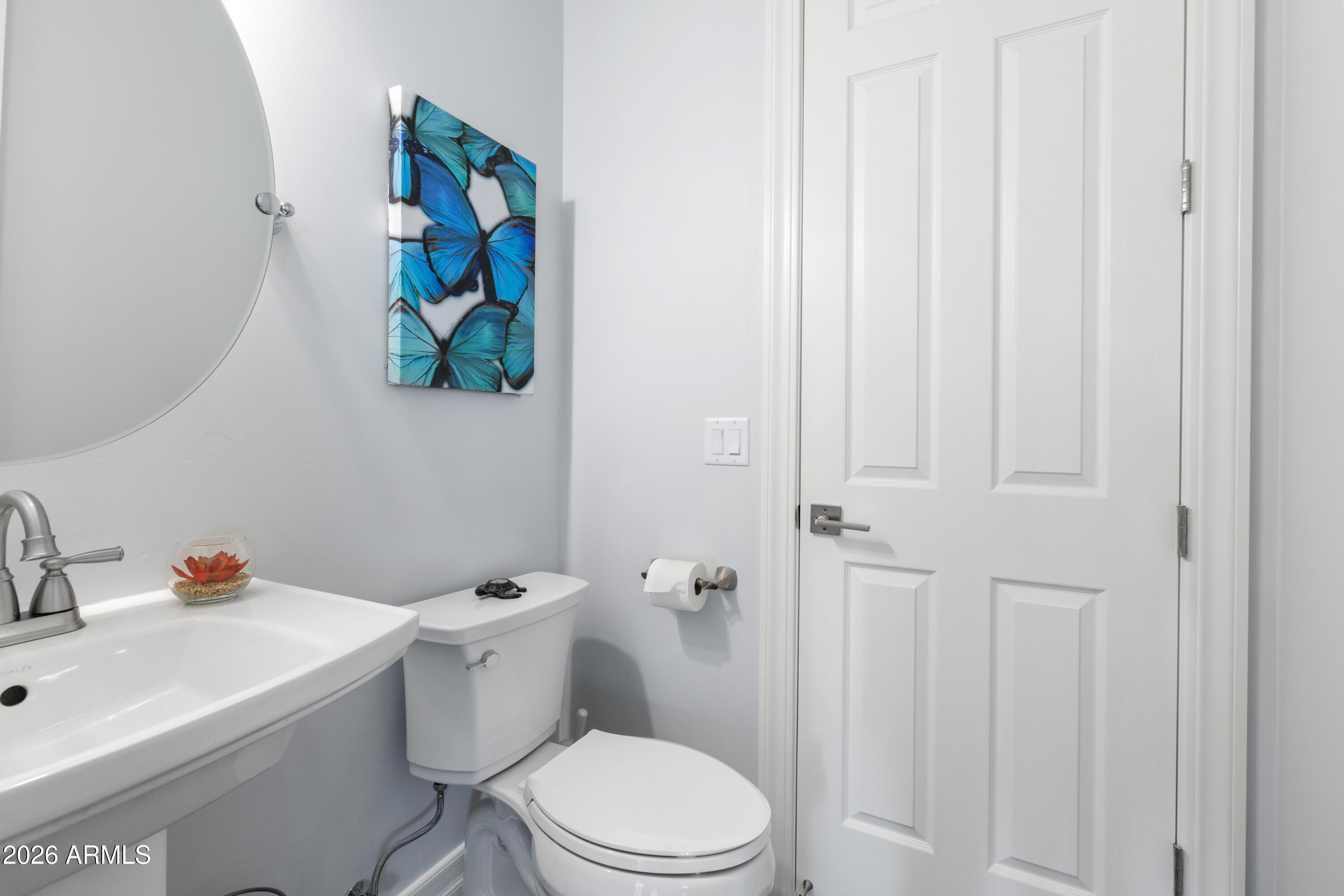 10 Ho Hum Circle Sedona, AZ 86351 - Photo 39 of 48 a white toilet sitting next to a bathroom sink