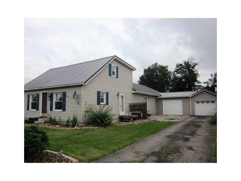 1961 Jefferson Road Rices Landing, PA 15357 - Photo 2 of 14 Exterior Front. An attached 2 car garage with blacktop driveway too!
