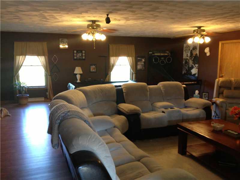 1961 Jefferson Road Rices Landing, PA 15357 - Photo 3 of 14 Family Room. Open and spacious 26 x 30 family room with easy to maintain laminate floors that are beautiful!