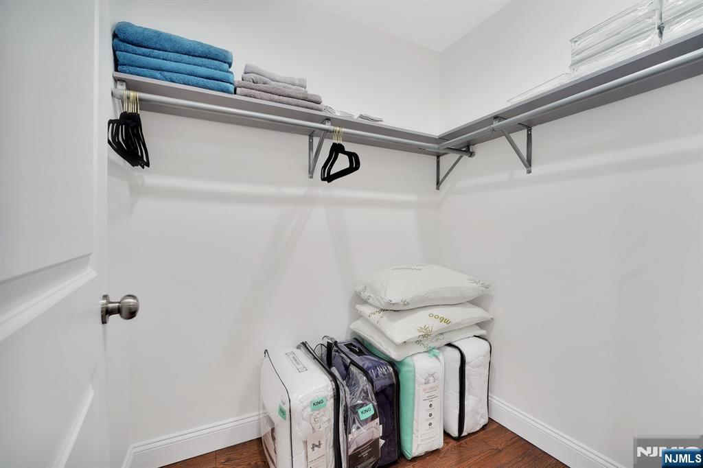 225 South 9th Street Newark, NJ 07103 - Photo 19 of 35 a view of storage and utility room with a washer dryer