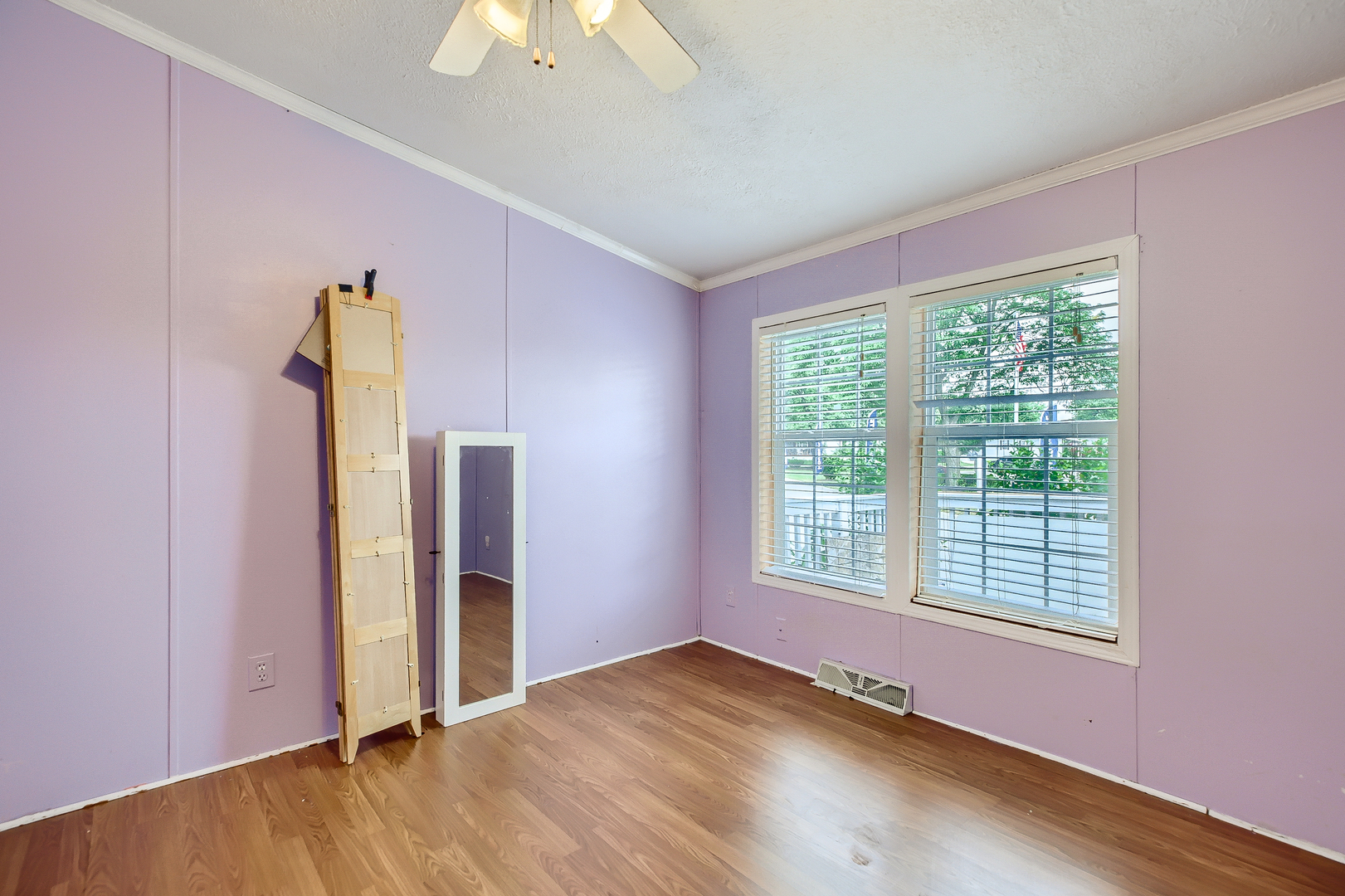 230 Whippletree Road Wheeling, IL 60090 - Photo 12 of 17 a view of an empty room with a window