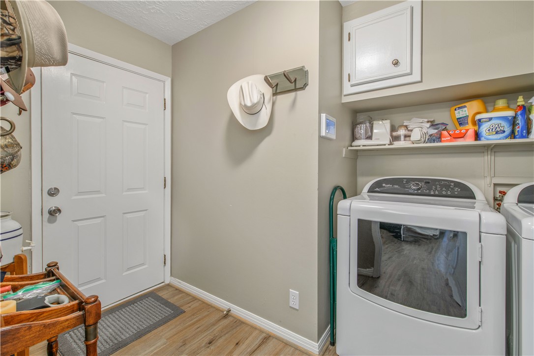 3675 Zulch Road North Zulch, TX 77872 - Photo 14 of 22 a utility room with dryer and washer
