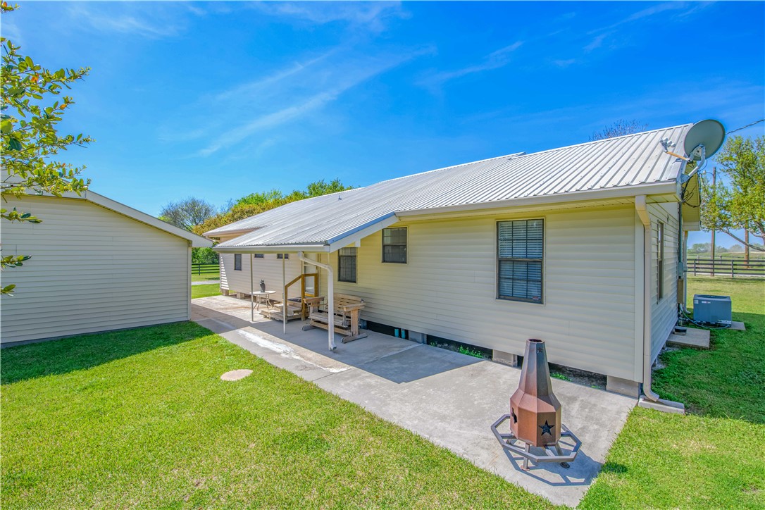 3675 Zulch Road North Zulch, TX 77872 - Photo 21 of 22 a front view of a house with a garden and sitting area