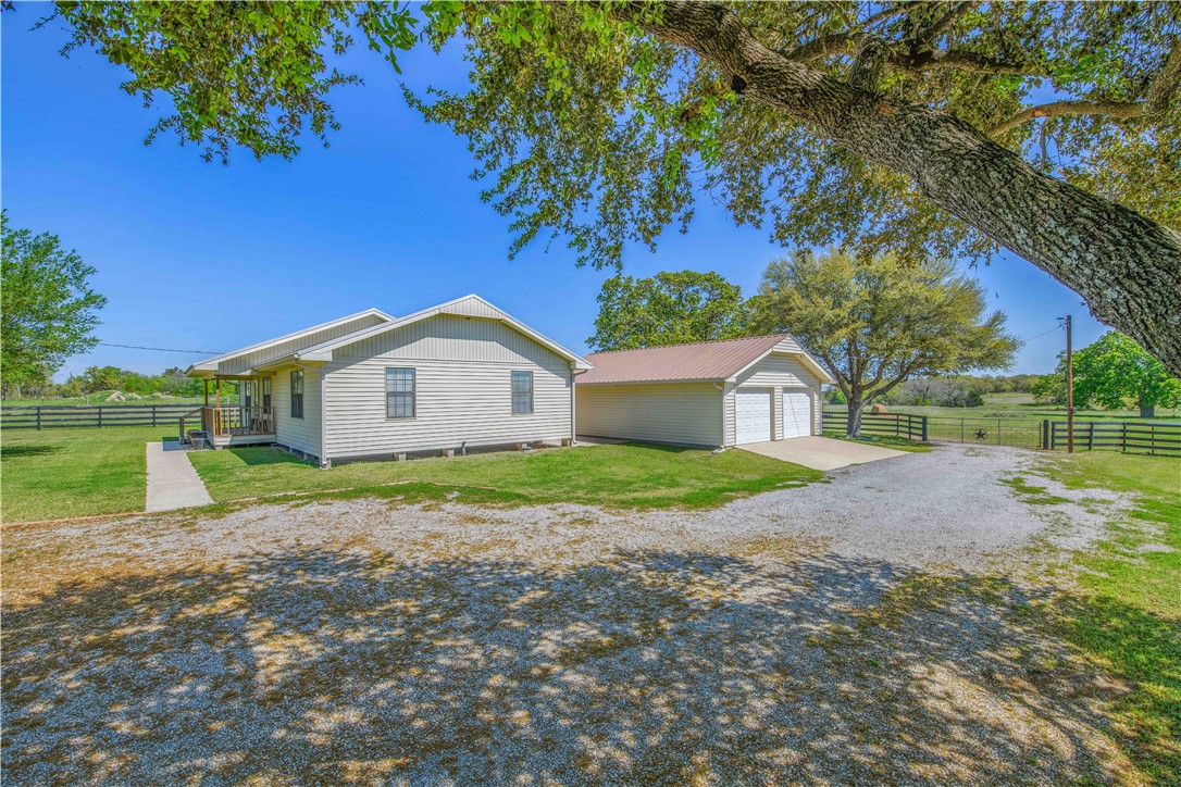 3675 Zulch Road North Zulch, TX 77872 - Photo 5 of 22 a view of a house with a yard and large tree