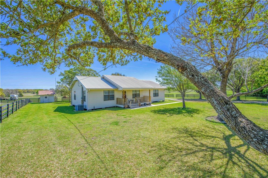 3675 Zulch Road North Zulch, TX 77872 - Photo 6 of 22 a house with swimming pool in front of it