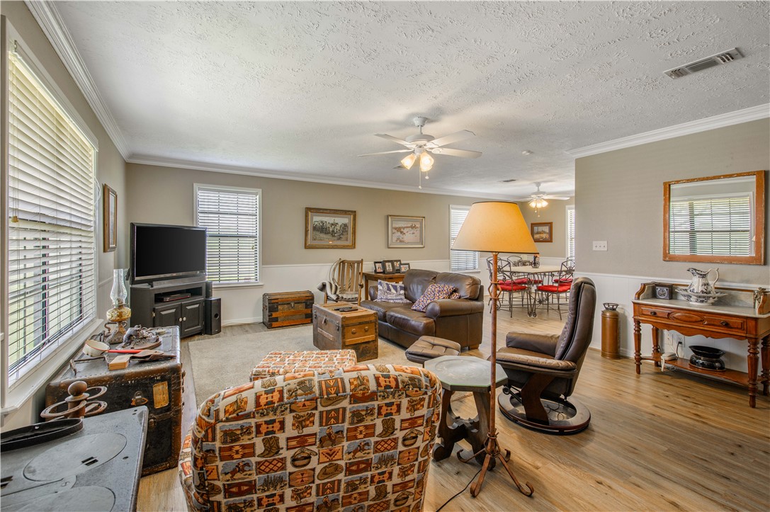 3675 Zulch Road North Zulch, TX 77872 - Photo 8 of 22 a living room with furniture and a flat screen tv