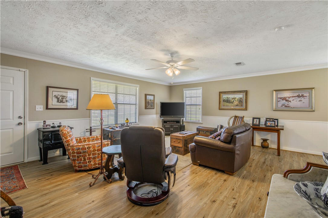 3675 Zulch Road North Zulch, TX 77872 - Photo 9 of 22 a living room with furniture and a wooden floor