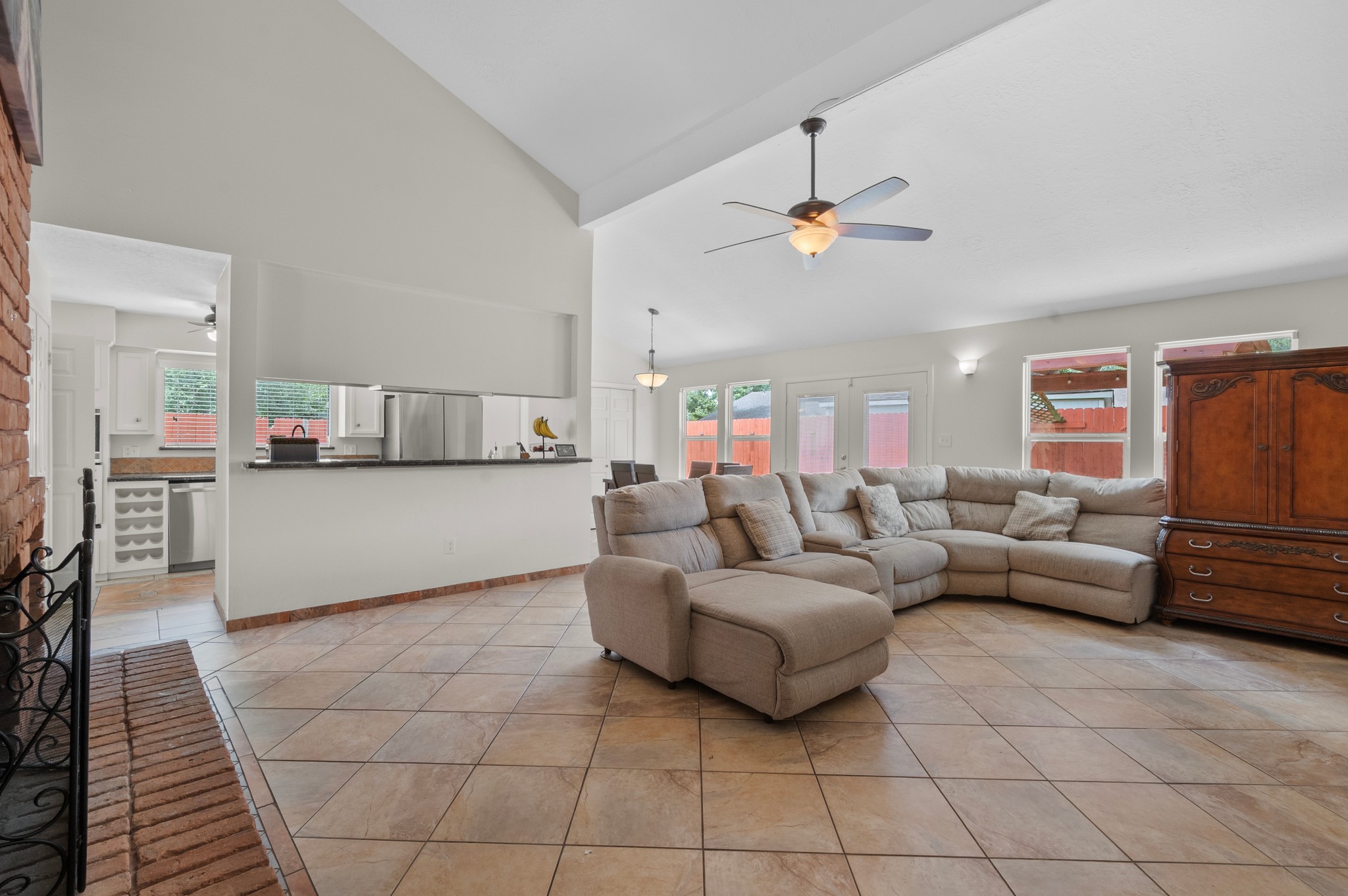 706 Geronimo Court Katy, TX 77450 - Photo 7 of 29 a living room with furniture and a chandelier