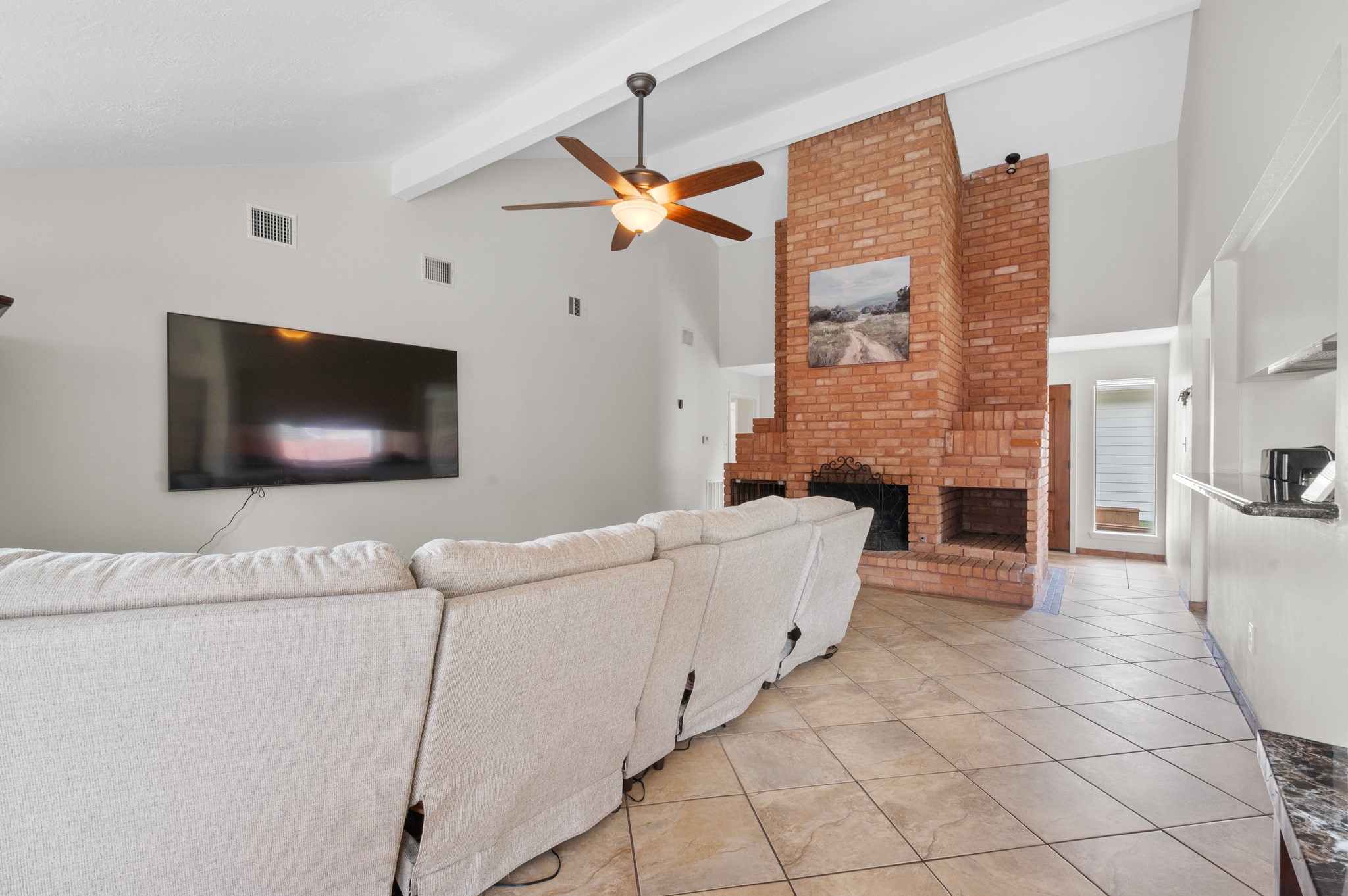 706 Geronimo Court Katy, TX 77450 - Photo 8 of 29 a living room with furniture and a flat screen tv