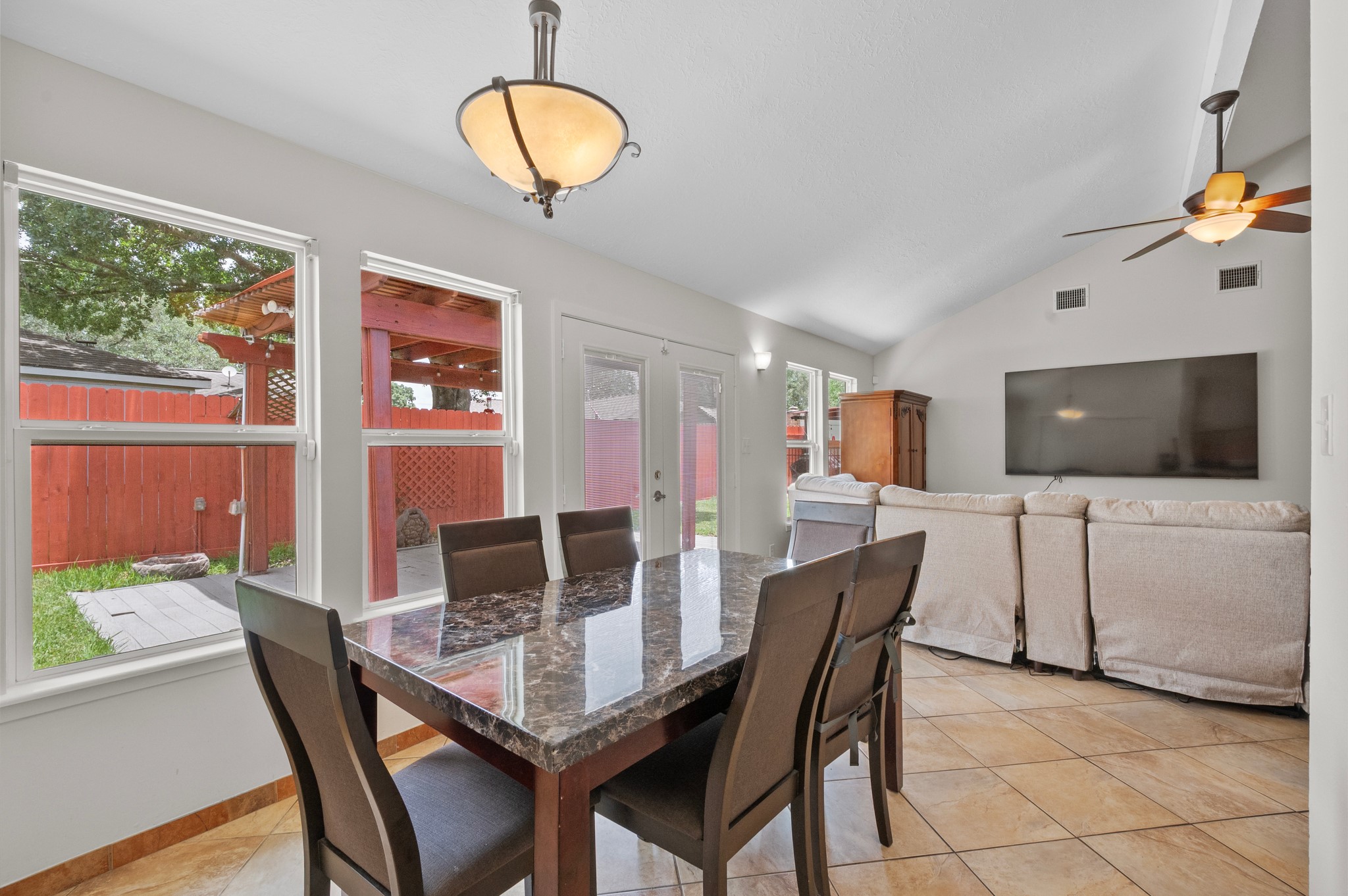 706 Geronimo Court Katy, TX 77450 - Photo 9 of 29 a dining room with furniture and window