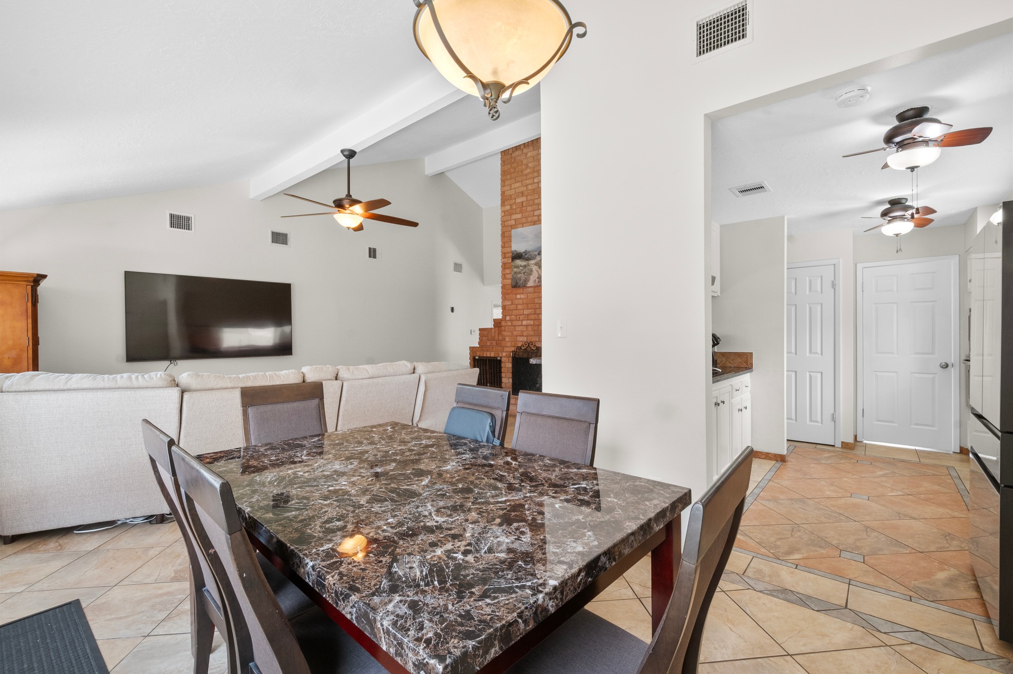 706 Geronimo Court Katy, TX 77450 - Photo 10 of 29 a living room with furniture and a flat screen tv