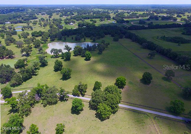 0 Northwest 95th Street Anthony, FL 32617 - Photo 7 of 14 an aerial view of lake residential house with outdoor space
