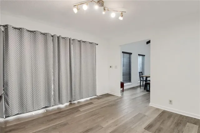 a bedroom with a bed and a desk