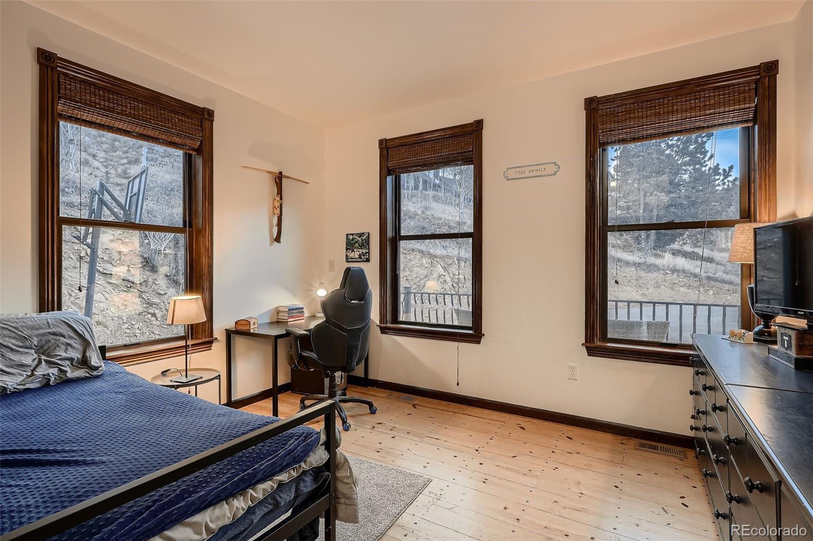 2169 Dory Hill Road Black Hawk, CO 80422 - Photo 21 of 46 a living room with furniture and windows