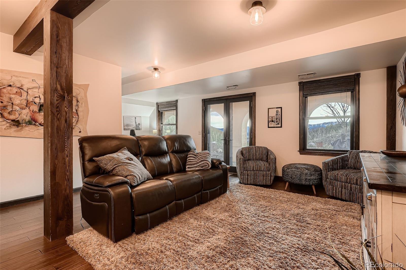 2169 Dory Hill Road Black Hawk, CO 80422 - Photo 24 of 46 a living room with furniture and a window