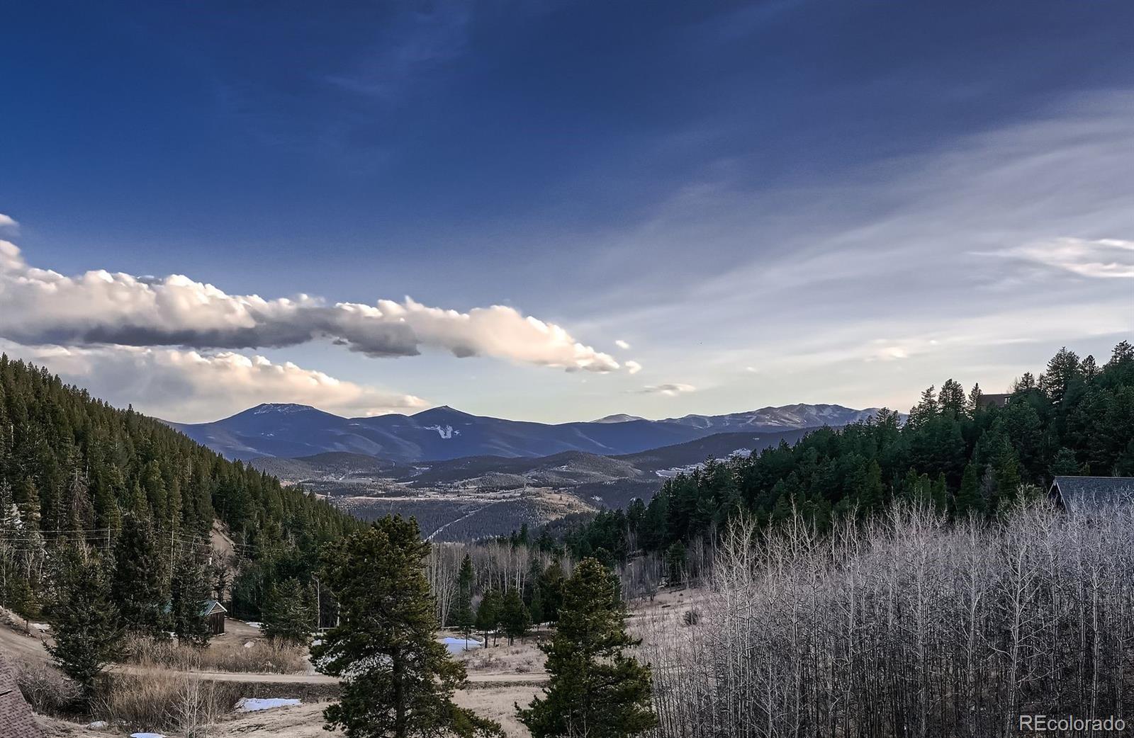 2169 Dory Hill Road Black Hawk, CO 80422 - Photo 29 of 46 a view of a lake with a mountain in the background
