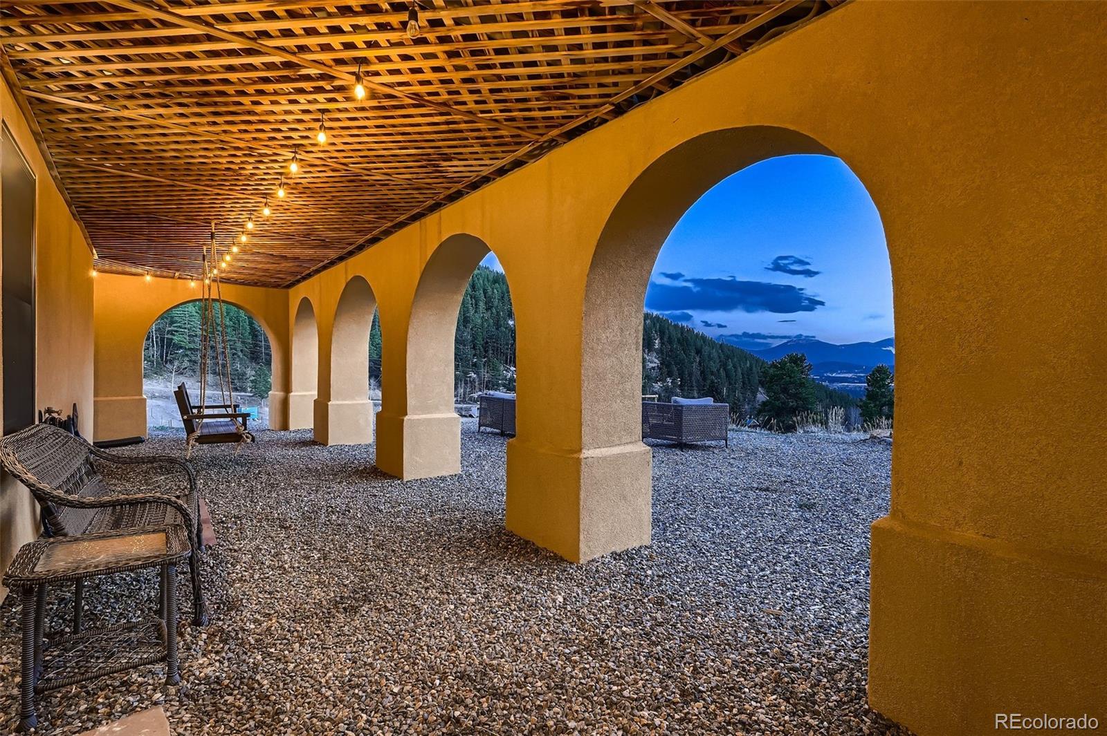 2169 Dory Hill Road Black Hawk, CO 80422 - Photo 32 of 46 a view of swimming pool with a backyard