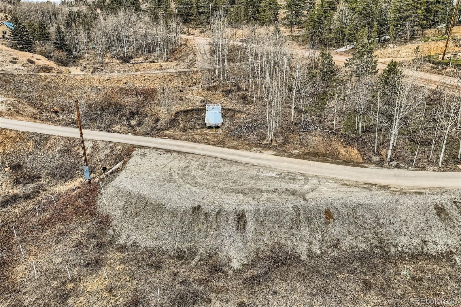 2169 Dory Hill Road Black Hawk, CO 80422 - Photo 46 of 46 a view of a yard with trees