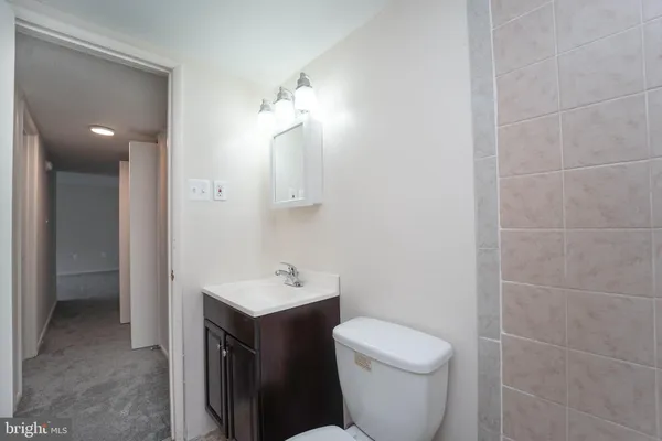 a view of an empty room and entryway