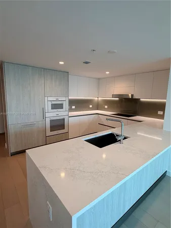 a view of a lake from a city