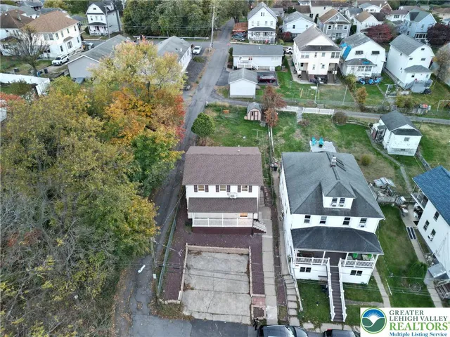 an aerial view of multiple house