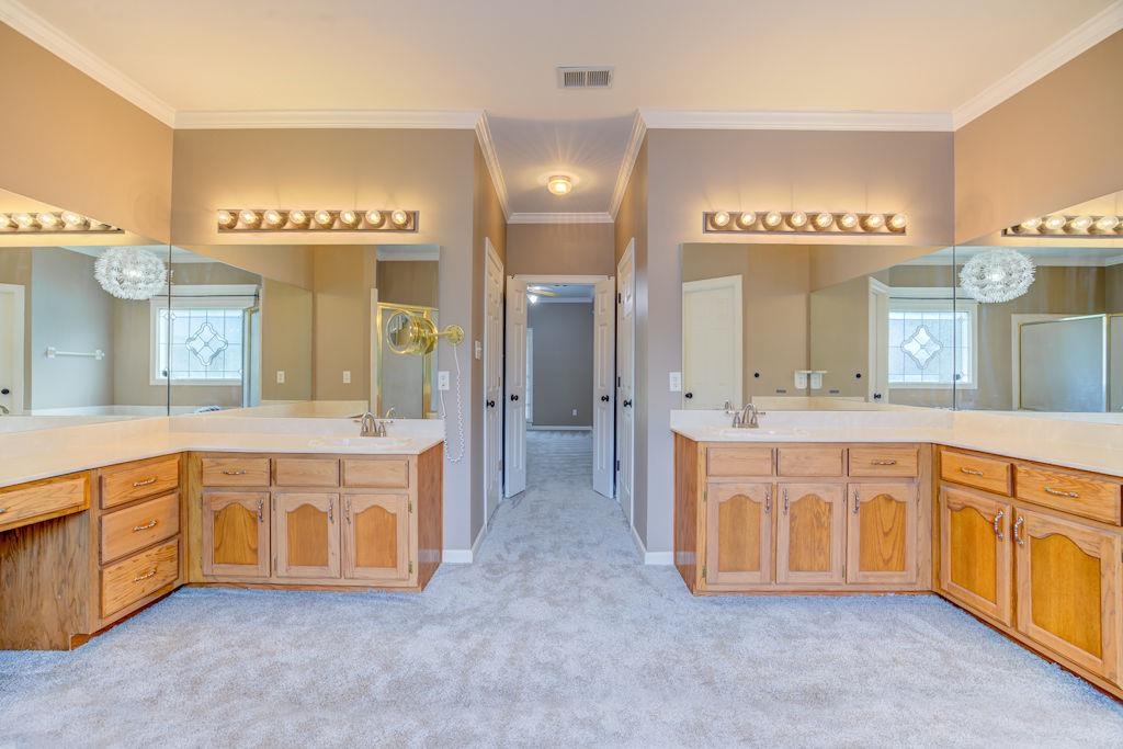 1633 Beckenhall Street Collierville, TN 38017 - Photo 18 of 35 a spacious bathroom with a granite countertop double vanity sink and a mirror