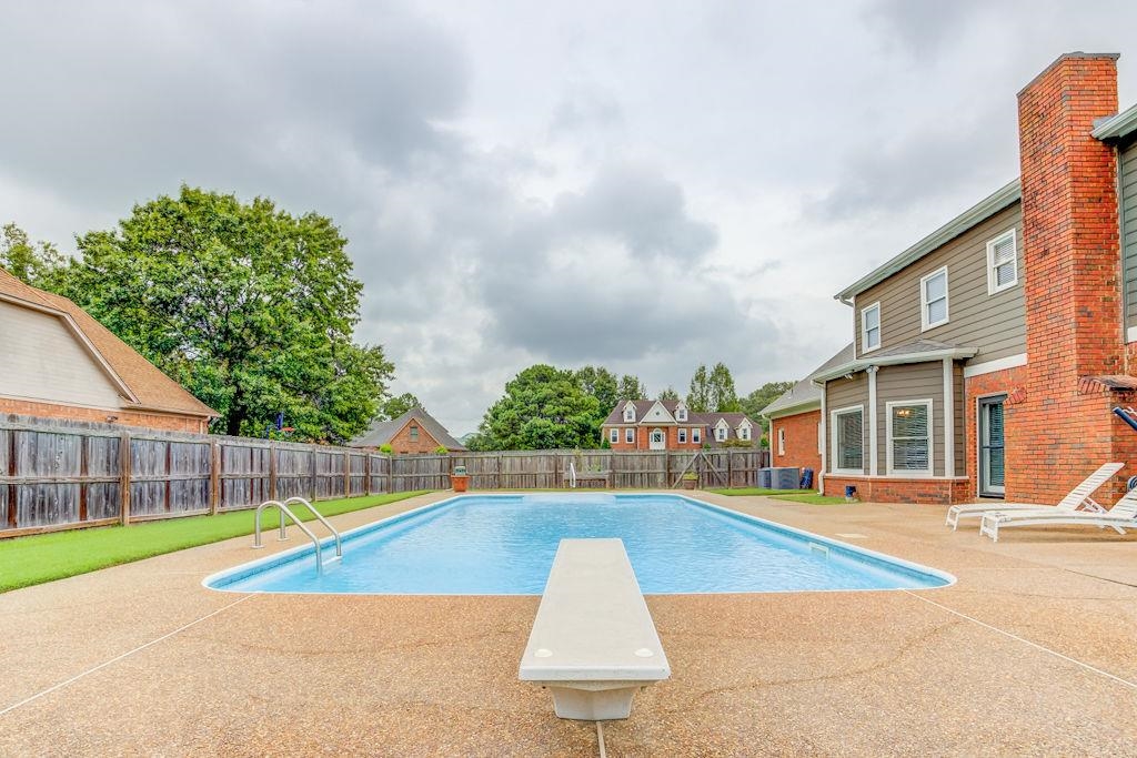 1633 Beckenhall Street Collierville, TN 38017 - Photo 33 of 35 a view of a swimming pool in front of a house