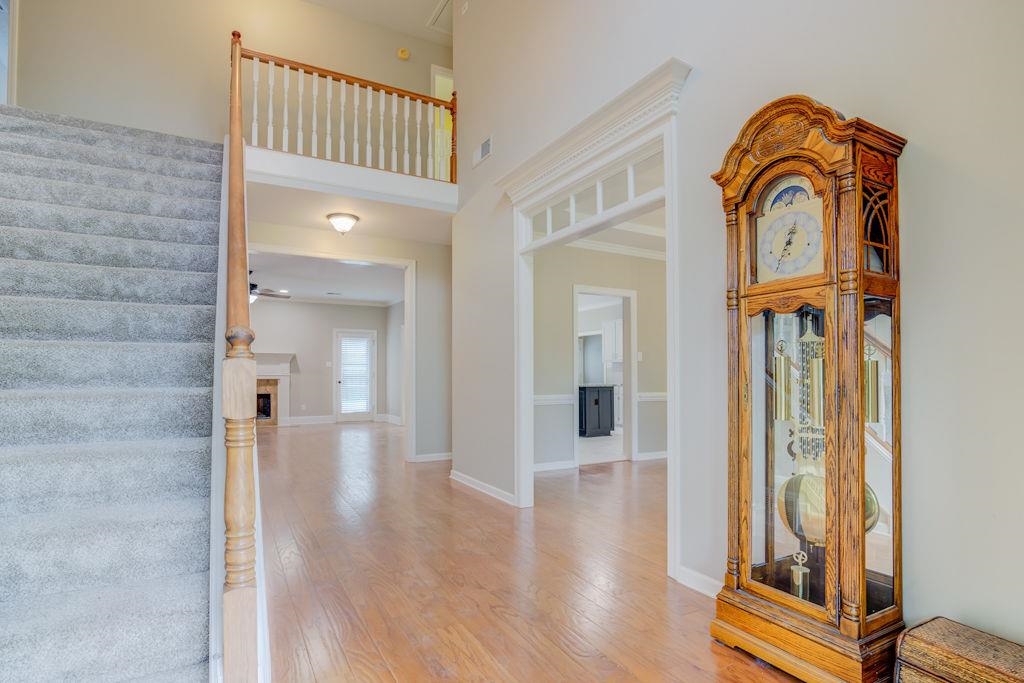 1633 Beckenhall Street Collierville, TN 38017 - Photo 4 of 35 a view of front door with wooden floor