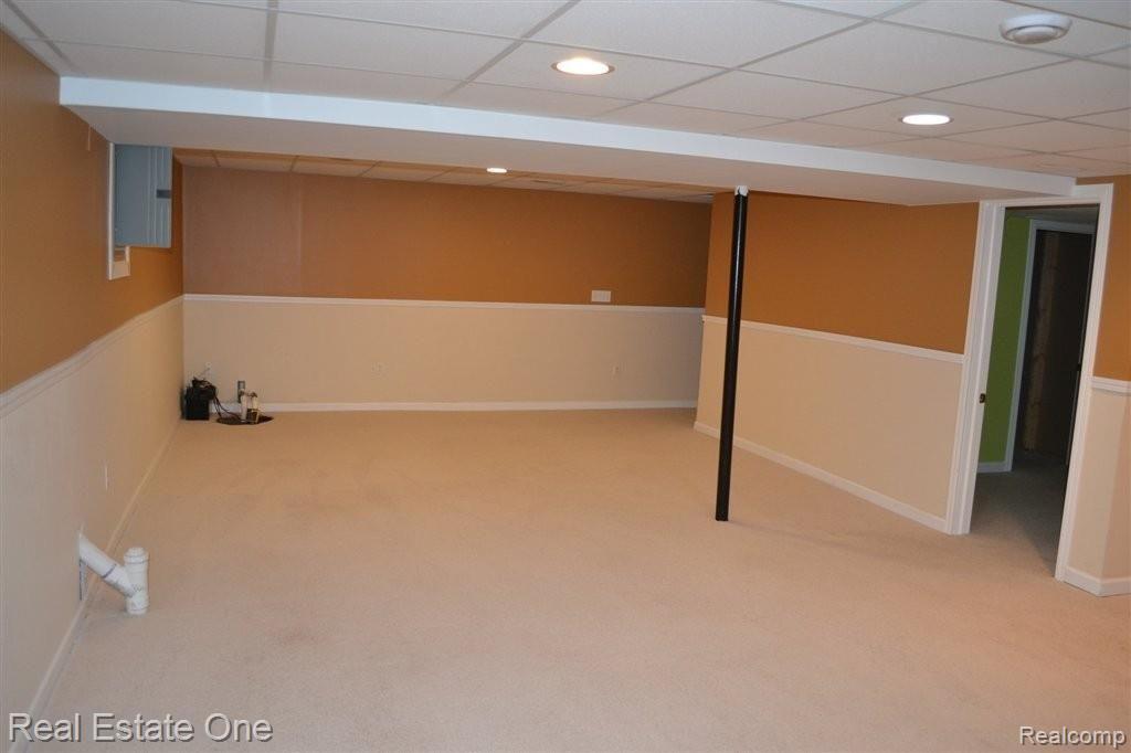 45586 Rathmore Drive, Unit 276 Macomb, MI 48044 - Photo 23 of 25 Finished Basement