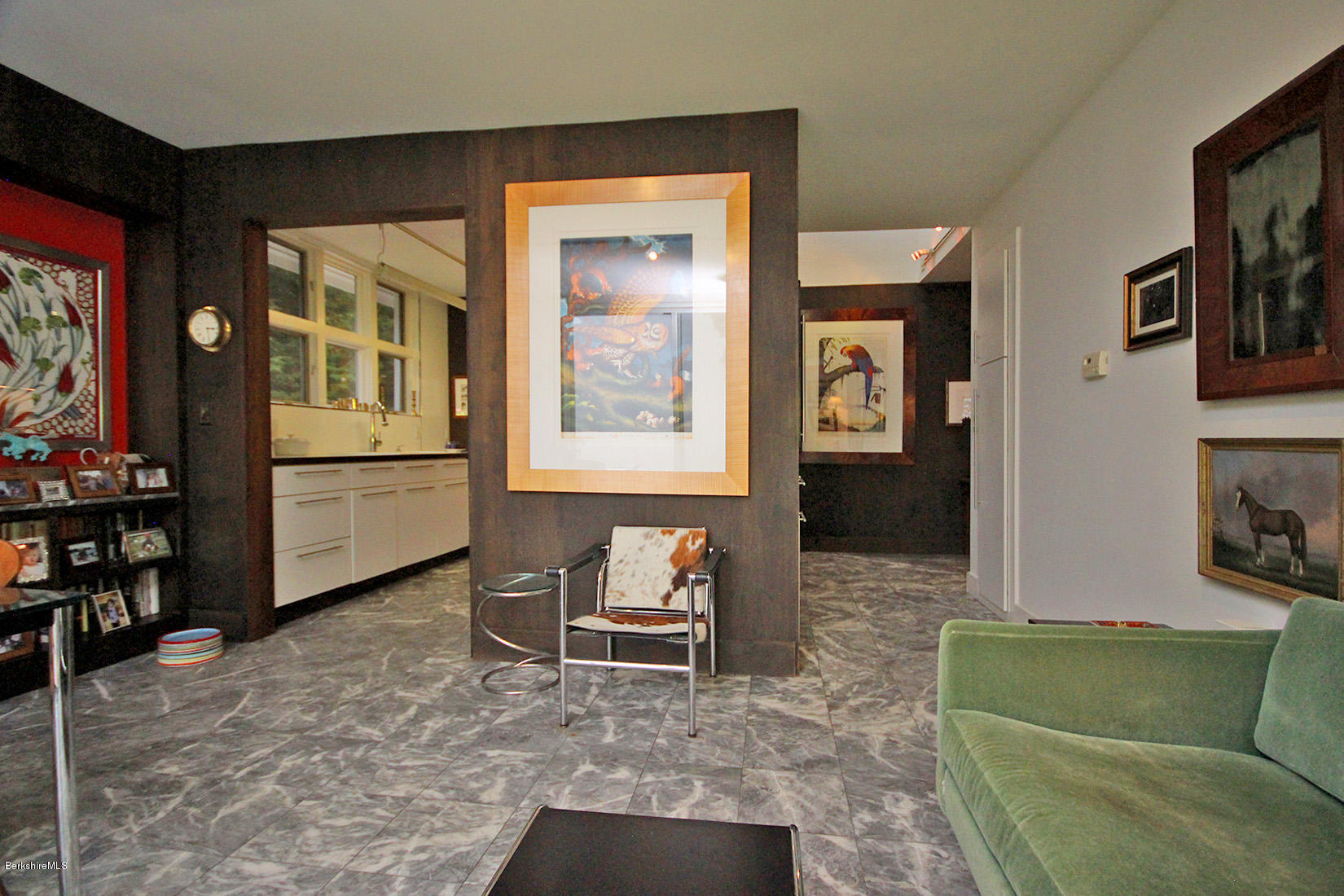 120 Reservoir Road Lenox, MA 01240 - Photo 22 of 51 a living room with furniture and a flat screen tv