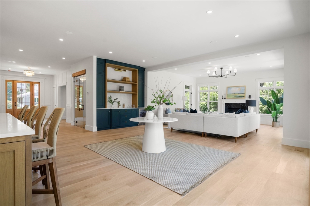 16 Foley Beach Road Hingham, MA 02043 - Photo 12 of 34 a living room with furniture and a fireplace