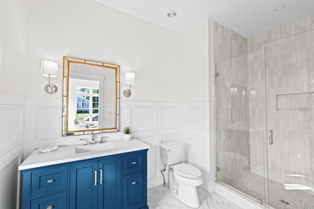 16 Foley Beach Road Hingham, MA 02043 - Photo 22 of 34 a bathroom with a sink a toilet and shower