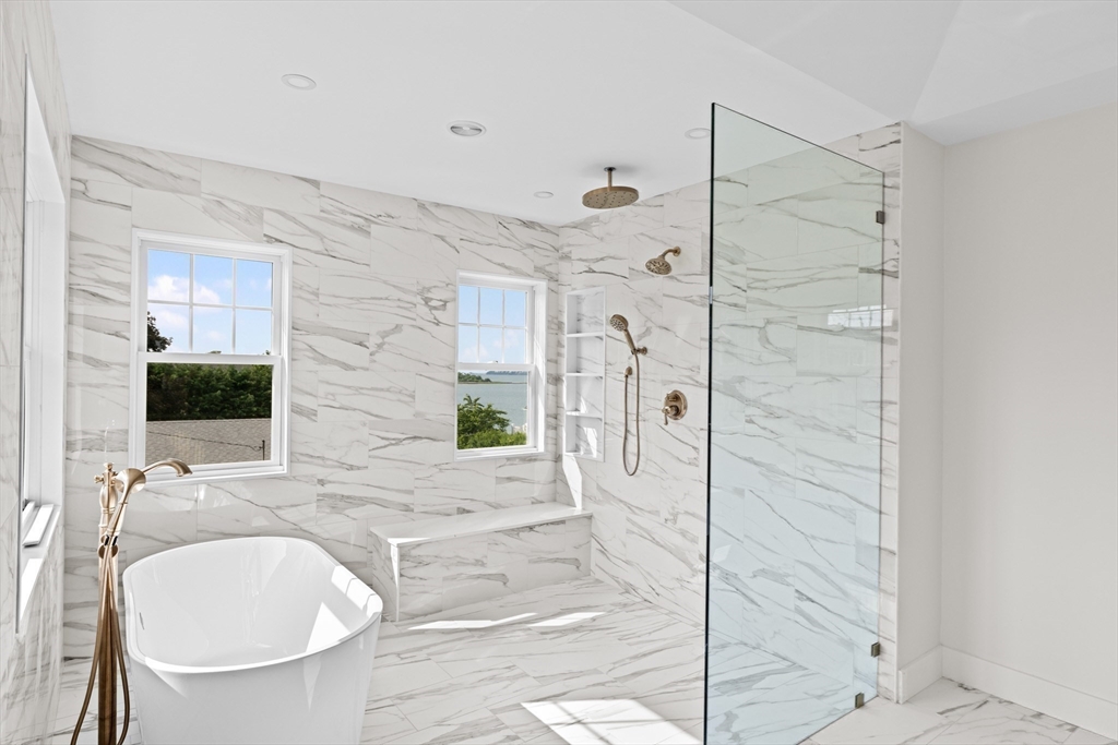 16 Foley Beach Road Hingham, MA 02043 - Photo 27 of 34 a bathroom with a sink and a mirror