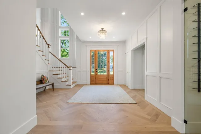 a view of a kitchen with dining table and chairs