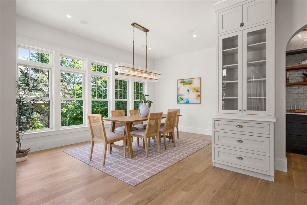 16 Foley Beach Road Hingham, MA 02043 - Photo 9 of 34 a view of a dining room with furniture window and wooden floor