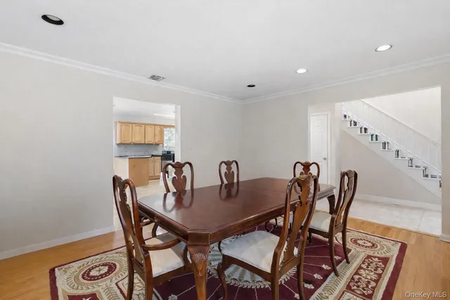 a view of a dining room with furniture