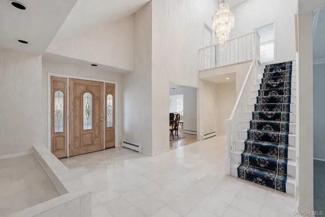 a view of a hallway with windows