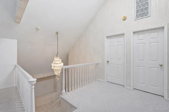 en empty room with white walls and white walls