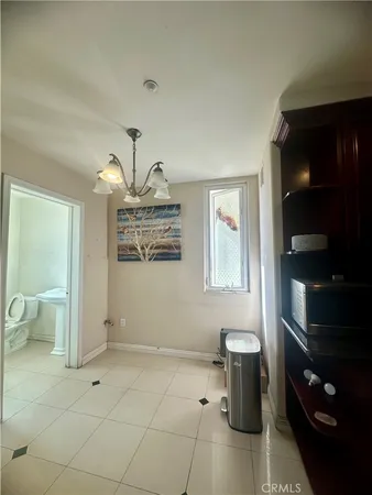 a view of livingroom with furniture and decor