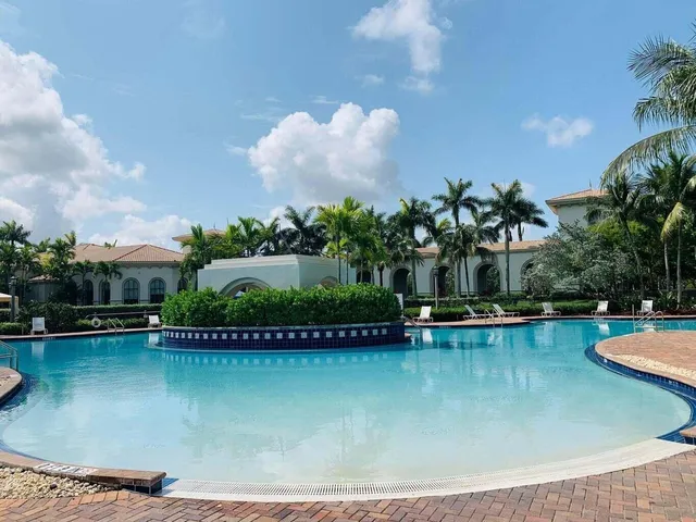 a view of a swimming pool and outdoor space