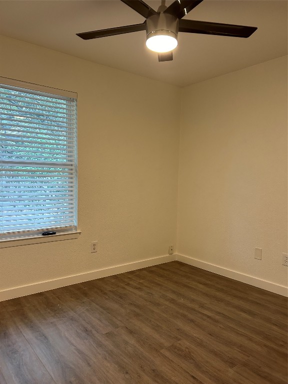5903 Cougar Drive, Unit B Austin, TX 78745 - Photo 9 of 16 a view of a room with wooden floor and window