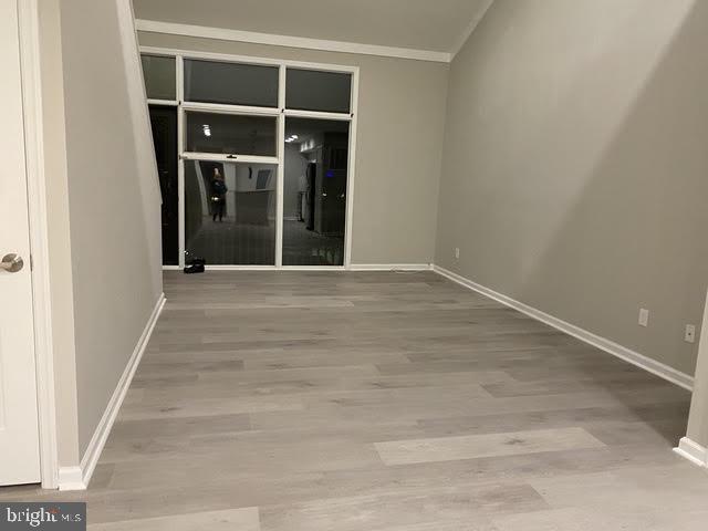 16 B Runnemede Road New Hope, PA 18938 - Photo 8 of 30 a view of an empty room with wooden floor and a window