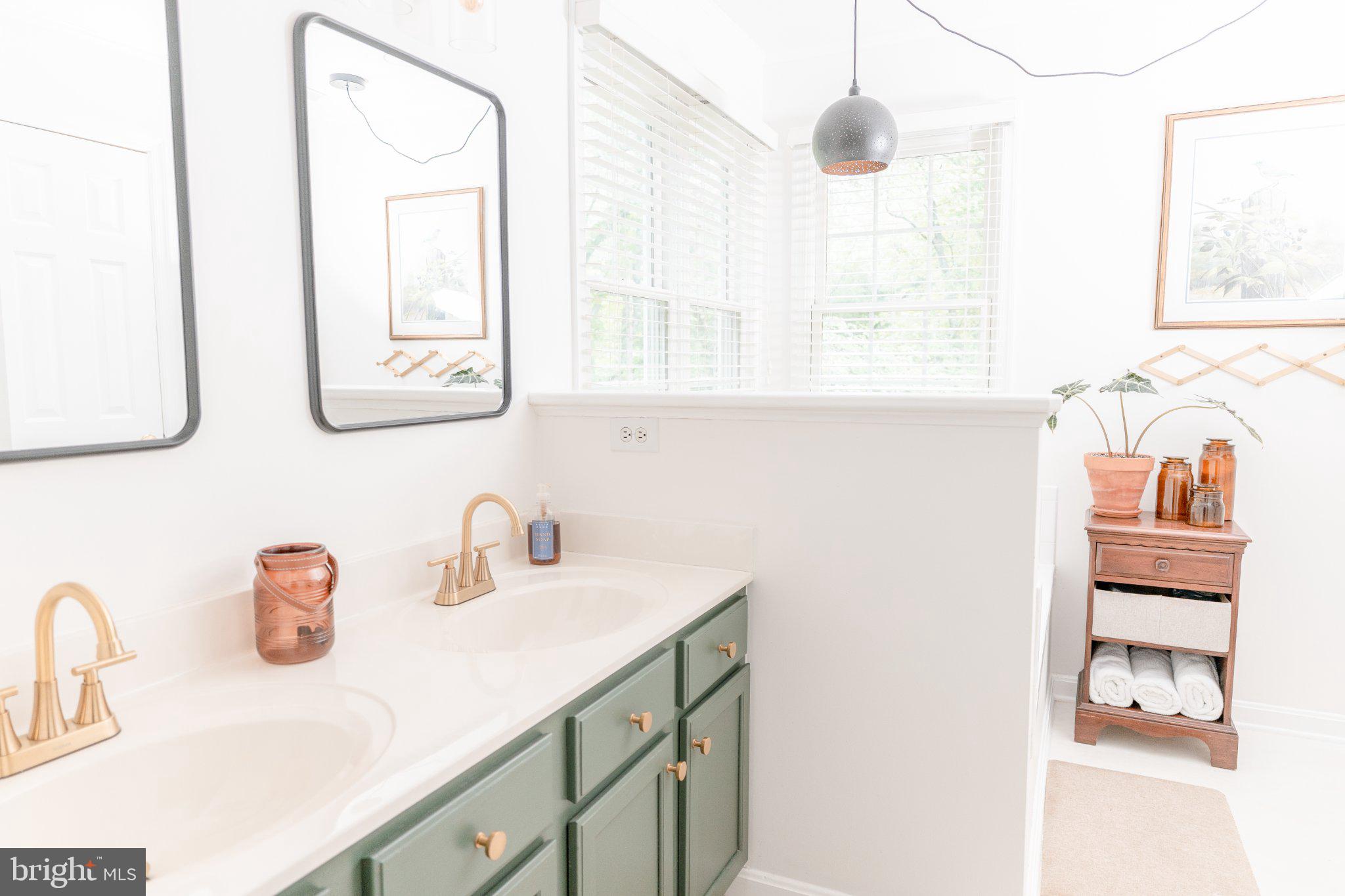 73 Village Grove Road Fredericksburg, VA 22406 - Photo 21 of 34 Elegant dual vanity in bright space.