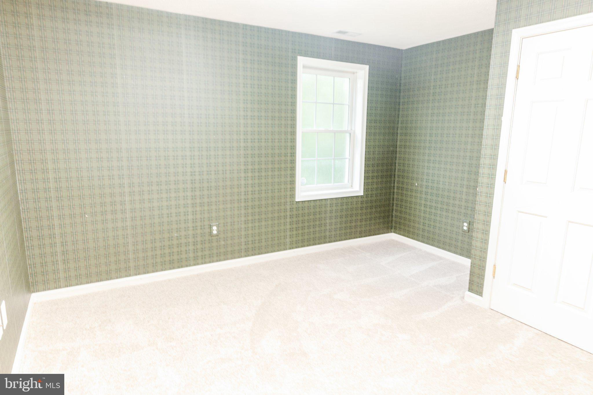 73 Village Grove Road Fredericksburg, VA 22406 - Photo 30 of 34 Bright, airy space with green accents.